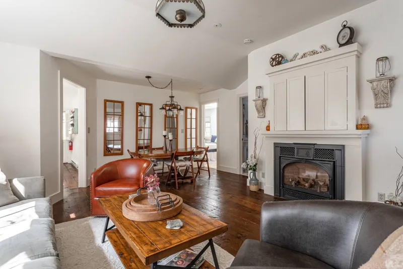Living Room: Stylish retreat with eclectic decor, inviting seating, and a charming fireplace!