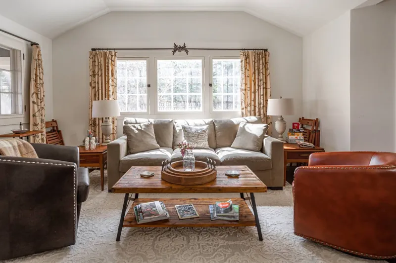 Living Room: Sun-drenched space with stylish seating and charming decor, perfect for relaxing!