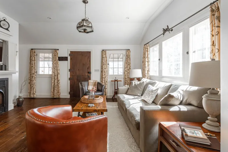 Living Room: Sunlit space with vintage charm, perfect for relaxing or gathering with friends!