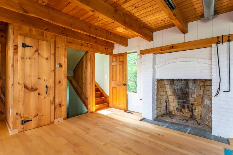 Living Room: Rustic charm meets modern light, perfect for gatherings or quiet evenings.