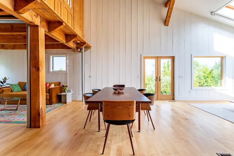 Dining Area: Sunlit space with modern décor, perfect for meals and gatherings with nature views!