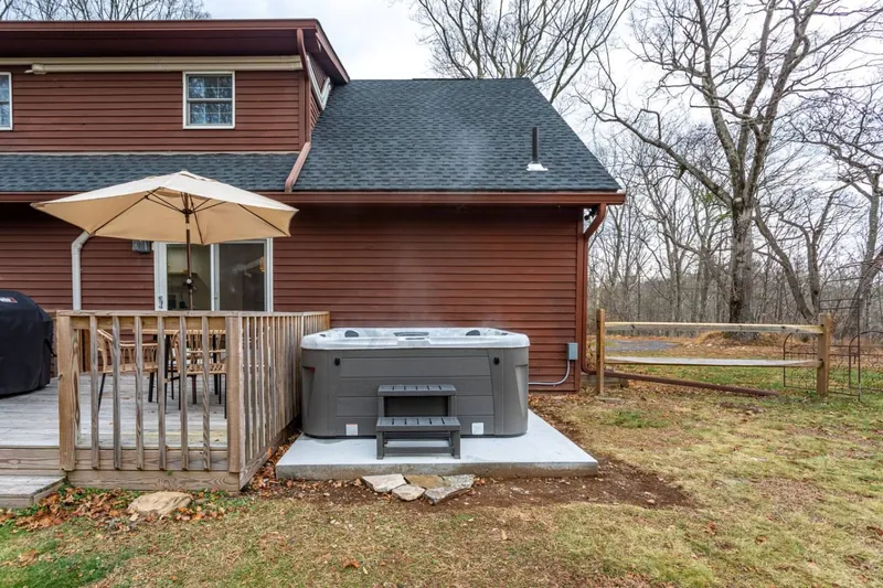 Unwind in the hot tub surrounded by nature's beauty! Perfect for relaxation!
