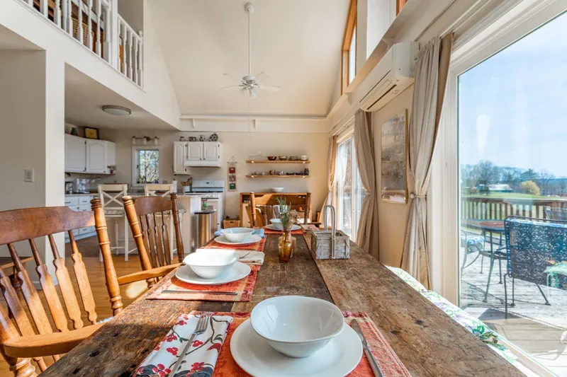 The dining and living spaces full of natural light, all year round.