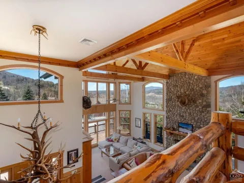Great Room: Soaring ceilings and panoramic views create the perfect gathering space!