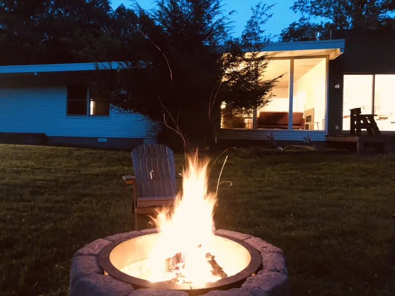 Outdoor fire pit for evening use, great for relaxing and light gatherings.