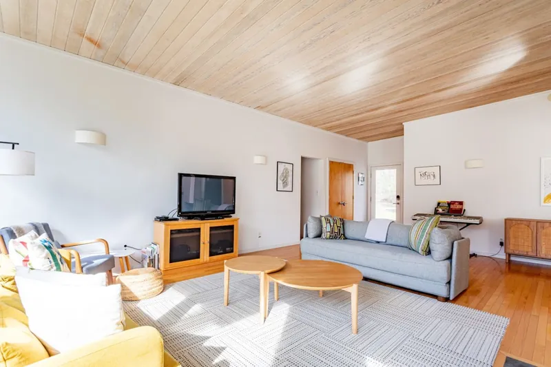 Living room with seating and flat-screen TV