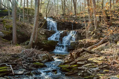 Tiered waterfall with rocky creek bed